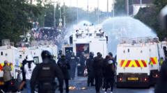 Water cannon fired in latest disorder after stabbing