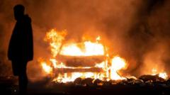 Police officer was set on fire during Ely riots, court told