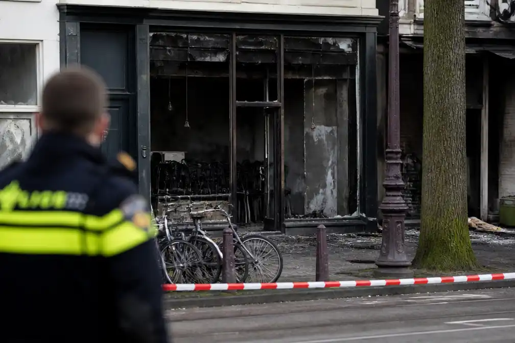 Amsterdammer vrijgesproken van bom-aanslag bij Pizzabakkers, veroordeeld voor wapenbezit